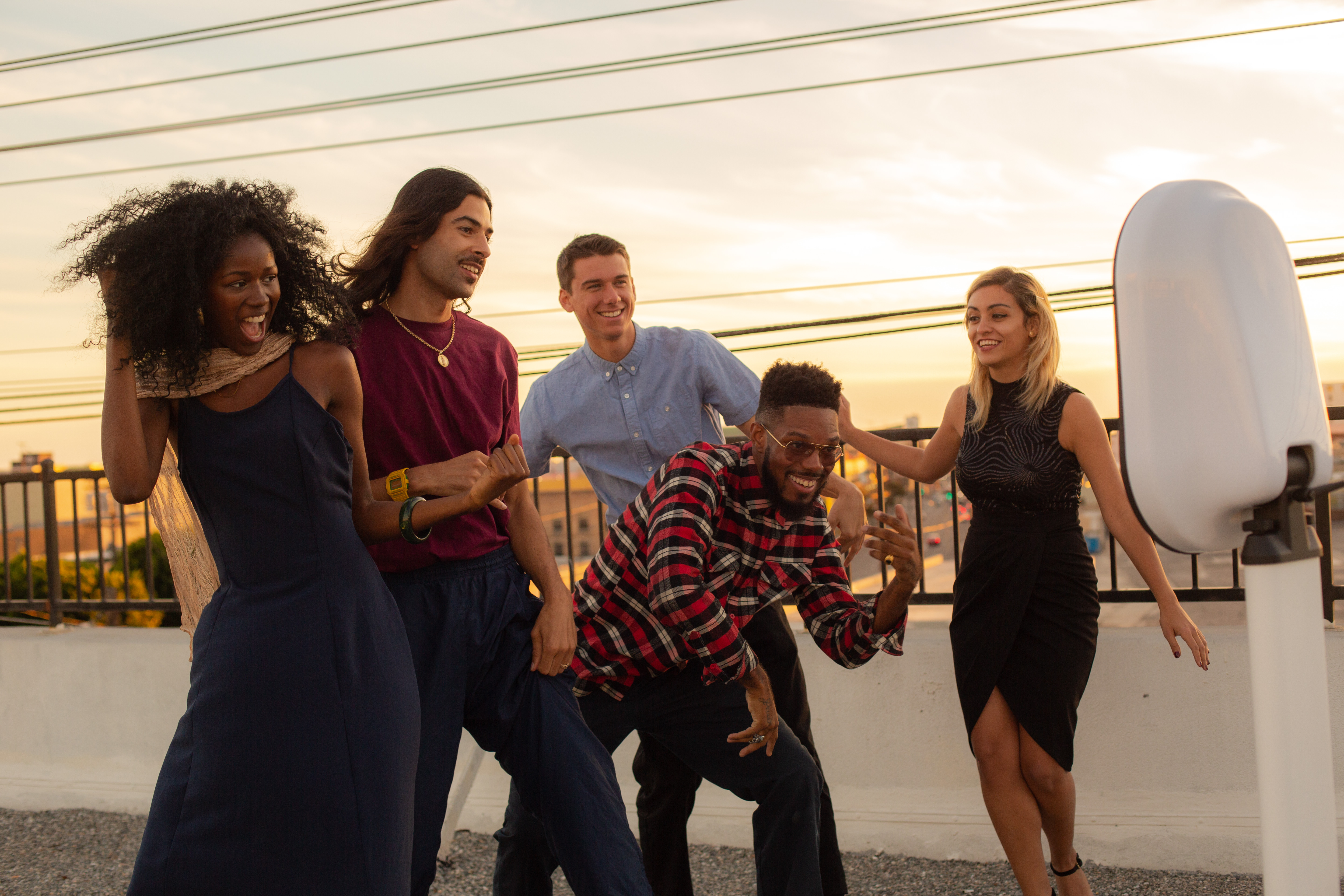 Happy friends laughing and posing together at an event